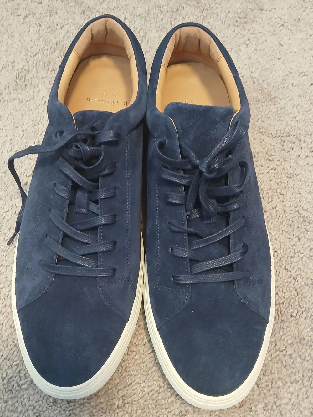 Polo Ralph Lauren Jermain sneakers feature a streamlined silhouette in navy blue